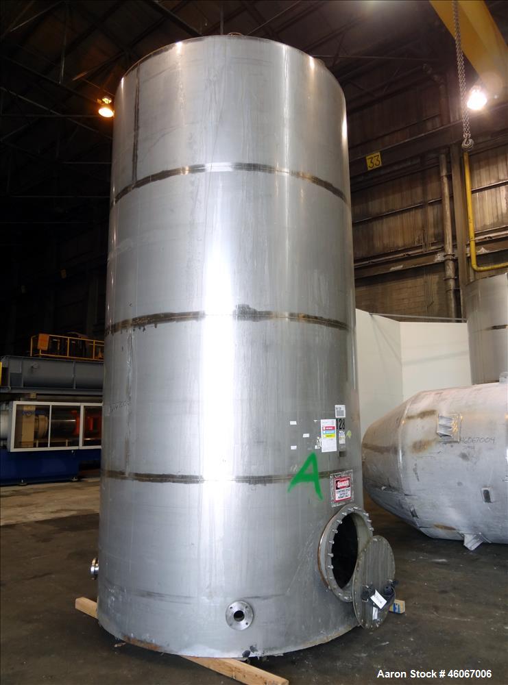 Used Acme Industrial Tank, 6000 Gallon, 304 Stainless Steel, Vertical. Approximate 192" Straight Side x 96" Diameter. Partial cone top, flat bottom. Top openings: 4", (3) 3", 6". Side openings: 24" m...