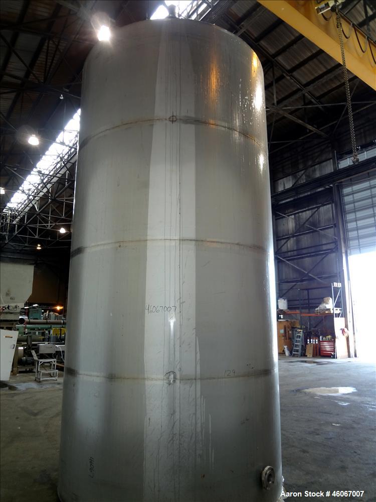 Used Acme Industrial Tank, 6000 Gallon, 304 Stainless Steel, Vertical. Approximate 192" Straight Side x 96" Diameter. Partial cone top, flat bottom. Top openings: 4", (3) 3", 6". Side openings: 24" m...