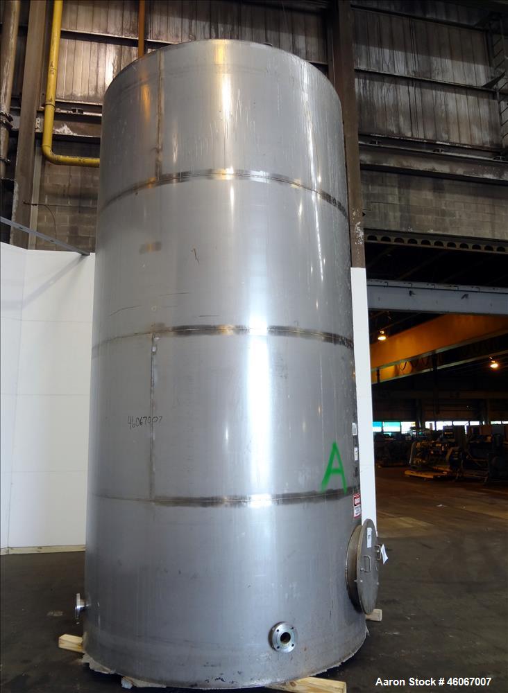 Used Acme Industrial Tank, 6000 Gallon, 304 Stainless Steel, Vertical. Approximate 192" Straight Side x 96" Diameter. Partial cone top, flat bottom. Top openings: 4", (3) 3", 6". Side openings: 24" m...