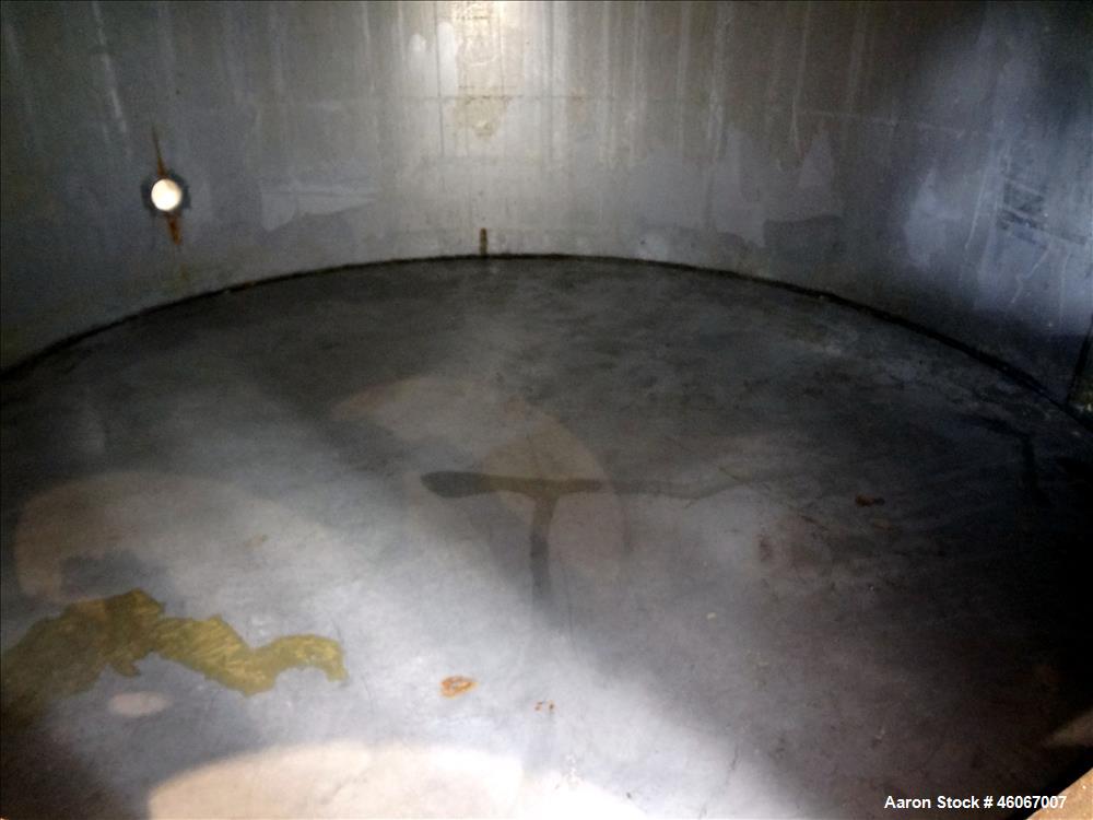 Used Acme Industrial Tank, 6000 Gallon, 304 Stainless Steel, Vertical. Approximate 192" Straight Side x 96" Diameter. Partial cone top, flat bottom. Top openings: 4", (3) 3", 6". Side openings: 24" m...