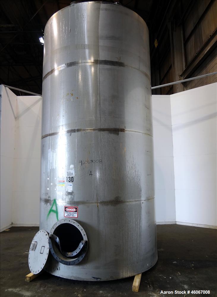 Used Acme Industrial Tank, 6000 Gallon, 304 Stainless Steel, Vertical. Approximate 192" Straight Side x 96" Diameter. Partial cone top, flat bottom. Top openings: 4", (3) 3", 6". Side openings: 24" m...