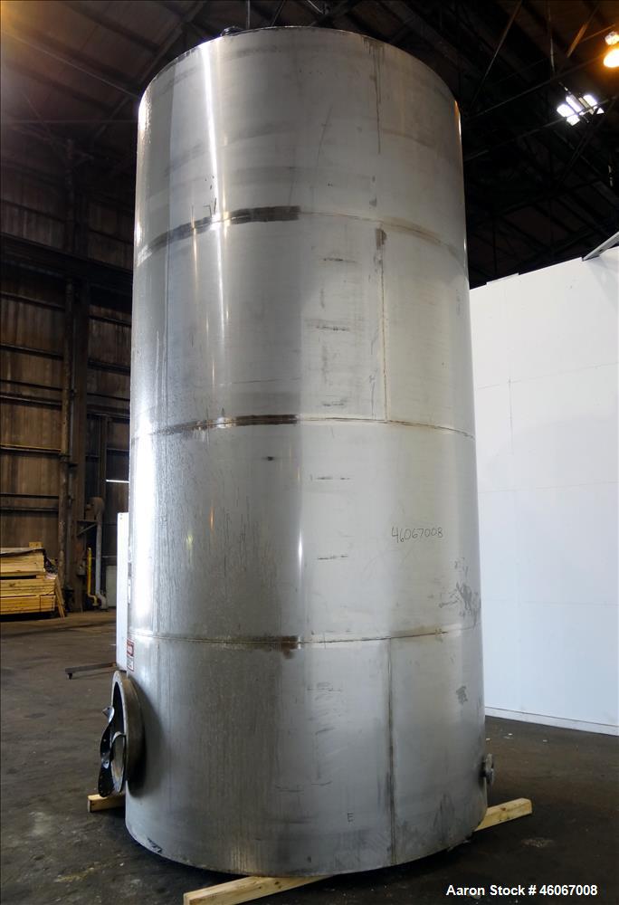 Used Acme Industrial Tank, 6000 Gallon, 304 Stainless Steel, Vertical. Approximate 192" Straight Side x 96" Diameter. Partial cone top, flat bottom. Top openings: 4", (3) 3", 6". Side openings: 24" m...