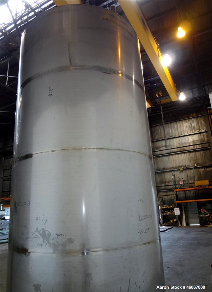 Used Acme Industrial Tank, 6000 Gallon, 304 Stainless Steel, Vertical. Approximate 192" Straight Side x 96" Diameter. Partial cone top, flat bottom. Top openings: 4", (3) 3", 6". Side openings: 24" m...