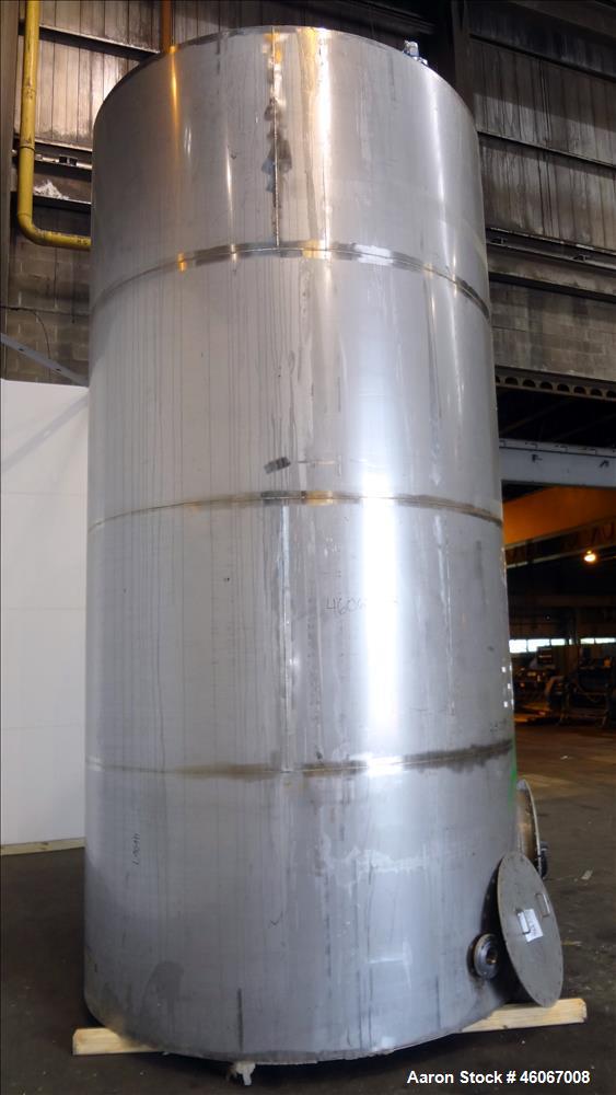Used Acme Industrial Tank, 6000 Gallon, 304 Stainless Steel, Vertical. Approximate 192" Straight Side x 96" Diameter. Partial cone top, flat bottom. Top openings: 4", (3) 3", 6". Side openings: 24" m...