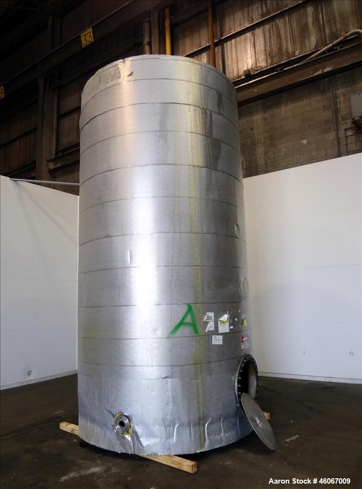 Used Acme Industrial Tank, 6000 Gallon, 304 Stainless Steel, Vertical. Approximate 192" Straight Side x 96" Diameter. Partial cone top, flat bottom. Side openings: 24" man way with cover, (2) 3". Ser...