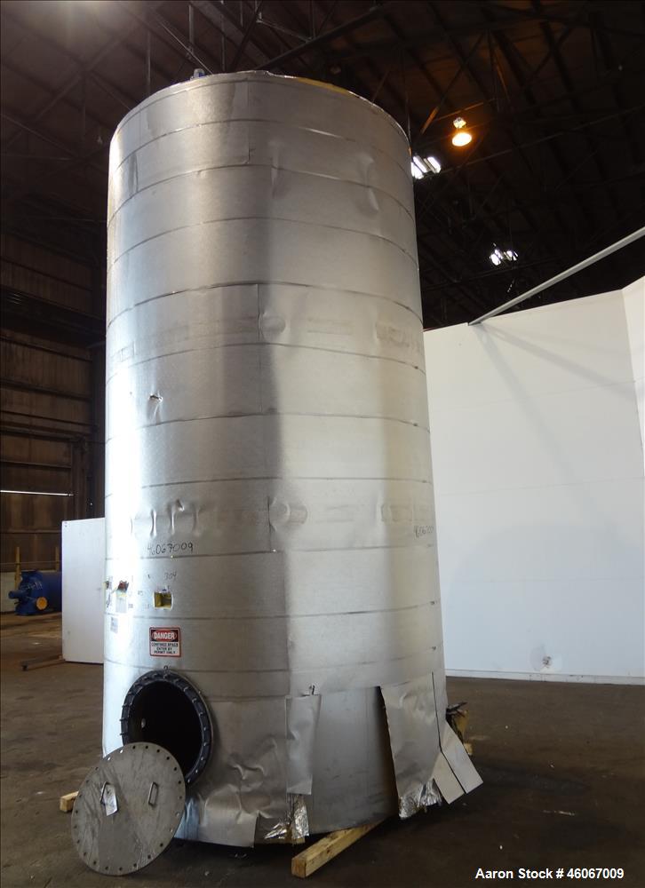 Used Acme Industrial Tank, 6000 Gallon, 304 Stainless Steel, Vertical. Approximate 192" Straight Side x 96" Diameter. Partial cone top, flat bottom. Side openings: 24" man way with cover, (2) 3". Ser...