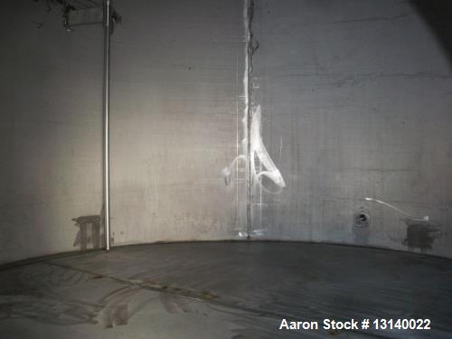 Used Alloy Fabricators Vertical Storage Tank. Approximately 8,000 gallon, 304 stainless steel. 10' diameter x 14'-3" high straight side. Design 3" water (EXT), 6" water (INT) at 140 degrees F. Flat b...