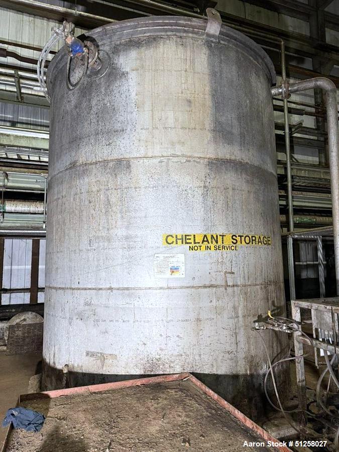 Used 7,000 Gallon Alloy Fabricators 316L Stainless Steel Vertical Tank. 10' diameter x 12' tall. Side manway.