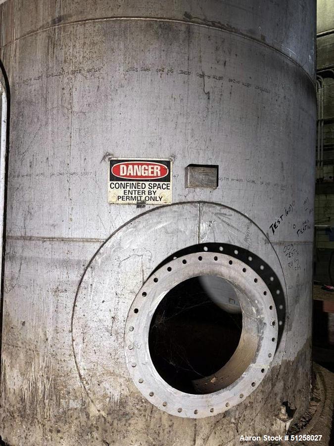 Used 7,000 Gallon Alloy Fabricators 316L Stainless Steel Vertical Tank. 10' diameter x 12' tall. Side manway.