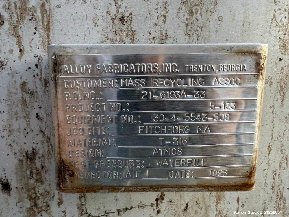 Used 7,000 Gallon Alloy Fabricators Stainless Steel Tank. 316L Stainless steel. Side manway. Flat top. Built 1995.