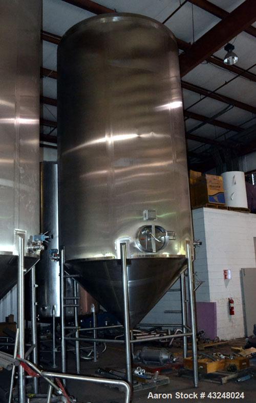 Used Apache Tank, 6500 Gallon, 316 Stainless Steel, Vertical. Approximate 102” diameter x 172” straight side. Dished top, 70” coned bottom. Side entering agitator with a 3 blade prop, driven by a 3hp...