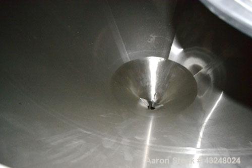 Used Apache Tank, 6500 Gallon, 316 Stainless Steel, Vertical. Approximate 102” diameter x 172” straight side. Dished top, 70” coned bottom. Side entering agitator with a 3 blade prop, driven by a 3hp...