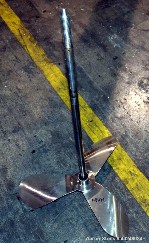 Used Apache Tank, 6500 Gallon, 316 Stainless Steel, Vertical. Approximate 102” diameter x 172” straight side. Dished top, 70” coned bottom. Side entering agitator with a 3 blade prop, driven by a 3hp...