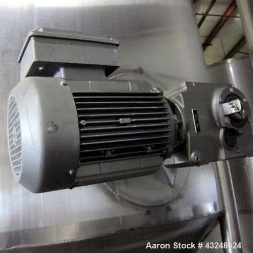 Used Apache Tank, 6500 Gallon, 316 Stainless Steel, Vertical. Approximate 102” diameter x 172” straight side. Dished top, 70” coned bottom. Side entering agitator with a 3 blade prop, driven by a 3hp...