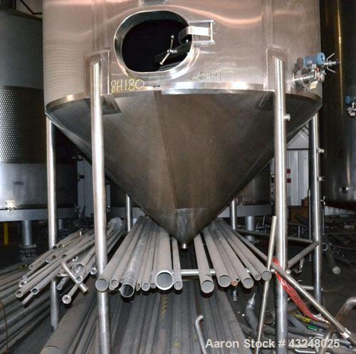 Used Apache Tank, 6500 Gallon, 316 Stainless Steel, Vertical. Approximate 102” diameter x 172” straight side. Dished top, 70” coned bottom. Side entering agitator with a 3 blade prop, driven by a 3hp...