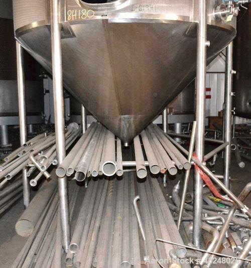 Used Apache Tank, 6500 Gallon, 316 Stainless Steel, Vertical. Approximate 102” diameter x 172” straight side. Dished top, 70” coned bottom. Side entering agitator with a 3 blade prop, driven by a 3hp...