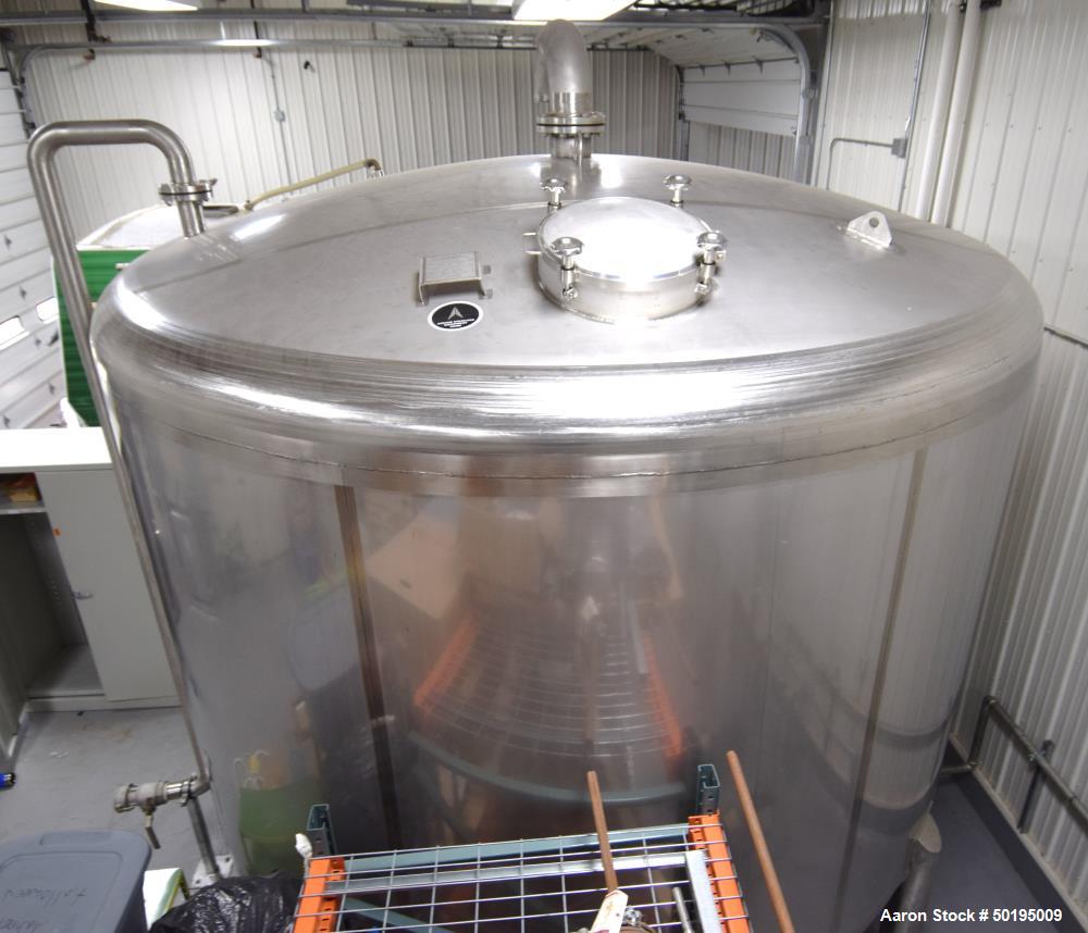 Used Apache Stainless Tank, 7000 Gallon, 316L Stainless Steel, Vertical. 144" Diameter x 84" straight side, dished top & bottom. Internal rated atmospheric at 100 degrees F. Top man way, center botto...