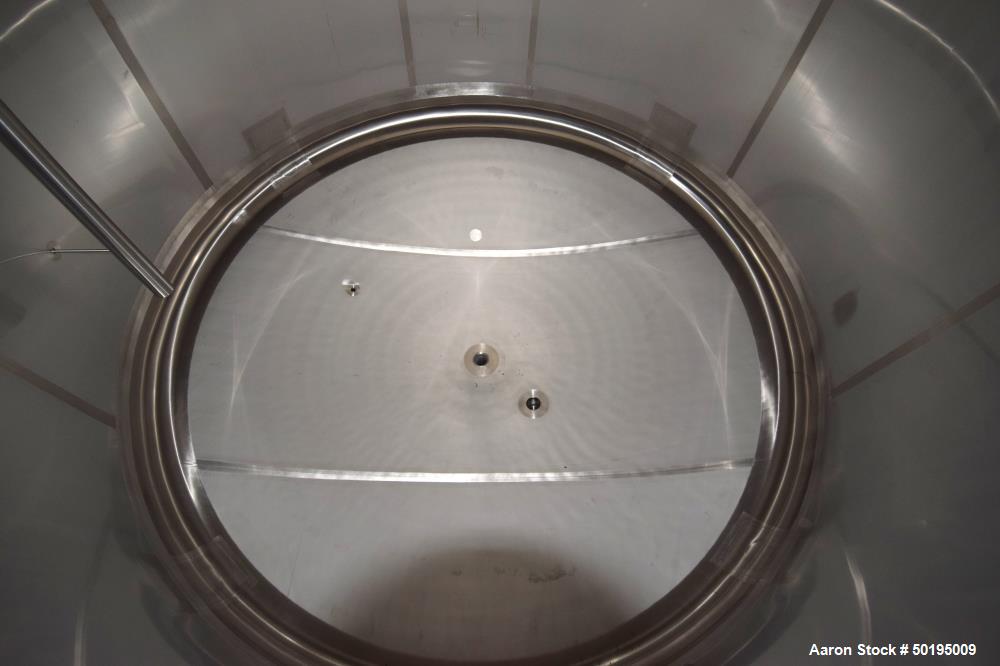 Used Apache Stainless Tank, 7000 Gallon, 316L Stainless Steel, Vertical. 144" Diameter x 84" straight side, dished top & bottom. Internal rated atmospheric at 100 degrees F. Top man way, center botto...