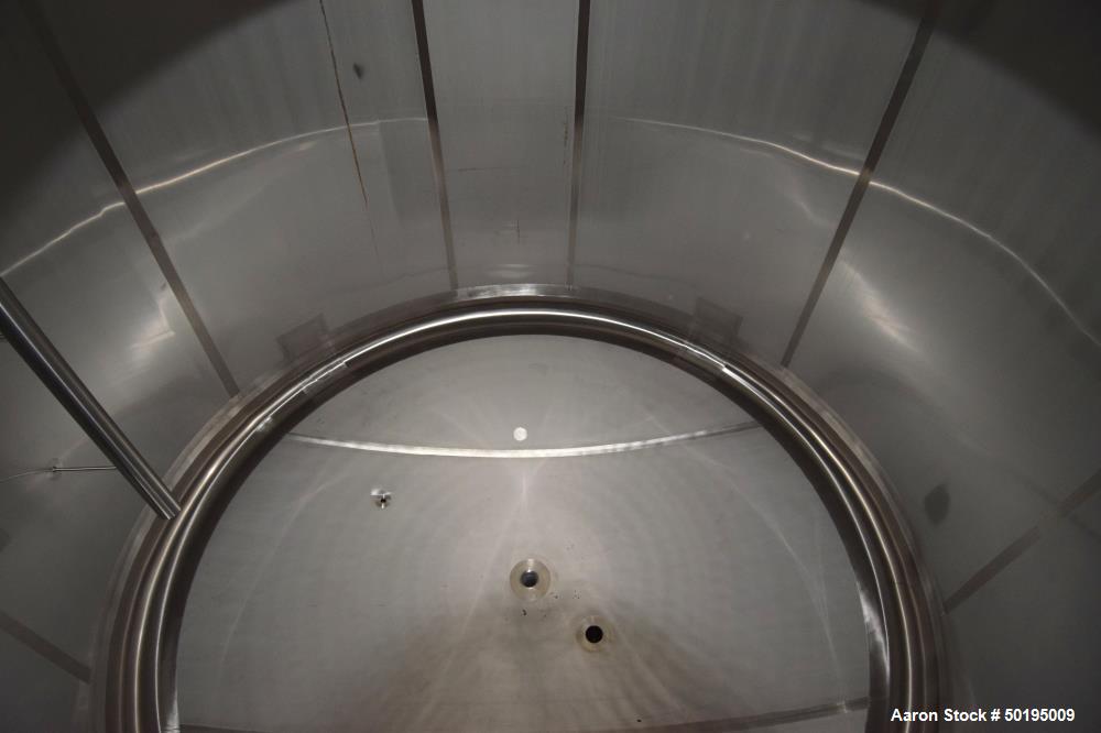 Used Apache Stainless Tank, 7000 Gallon, 316L Stainless Steel, Vertical. 144" Diameter x 84" straight side, dished top & bottom. Internal rated atmospheric at 100 degrees F. Top man way, center botto...