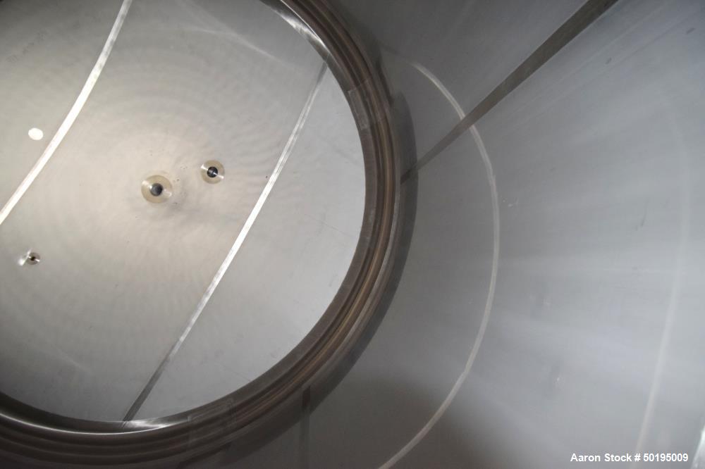 Used Apache Stainless Tank, 7000 Gallon, 316L Stainless Steel, Vertical. 144" Diameter x 84" straight side, dished top & bottom. Internal rated atmospheric at 100 degrees F. Top man way, center botto...