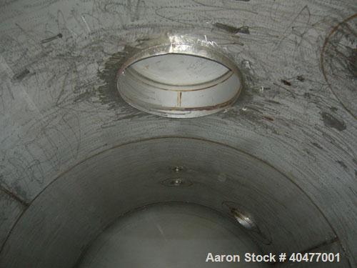 Used Applied Engineering Pressure Tank, 8,100 gallon, 304L stainless steel, horizontal. 9' diameter x 14'2'' long, 2 to 1 elliptical heads. Internal rated 16 psi at 150 deg F. Openings: top 2'', 3'',...