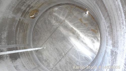 Used Bendel Tank, 10,000 Gallon, 304L Stainless Steel, Vertical.  Approximately 136” diameter x 165” straight side, slight coned top, sloped bottom.  UL Rated for above ground flammable storage, UL #...