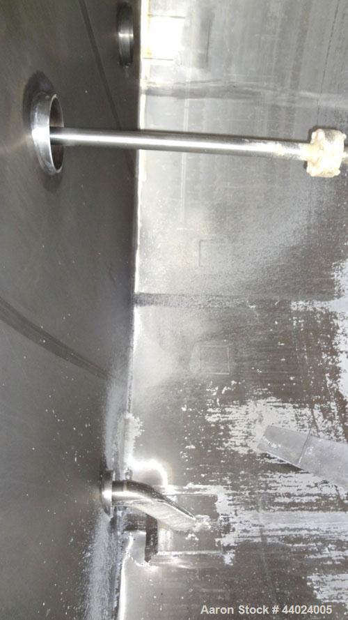 Used Bendel Tank, 10,000 Gallon, 304L Stainless Steel, Vertical.  Approximately 136” diameter x 165” straight side, slight coned top, sloped bottom.  UL Rated for above ground flammable storage, UL #...