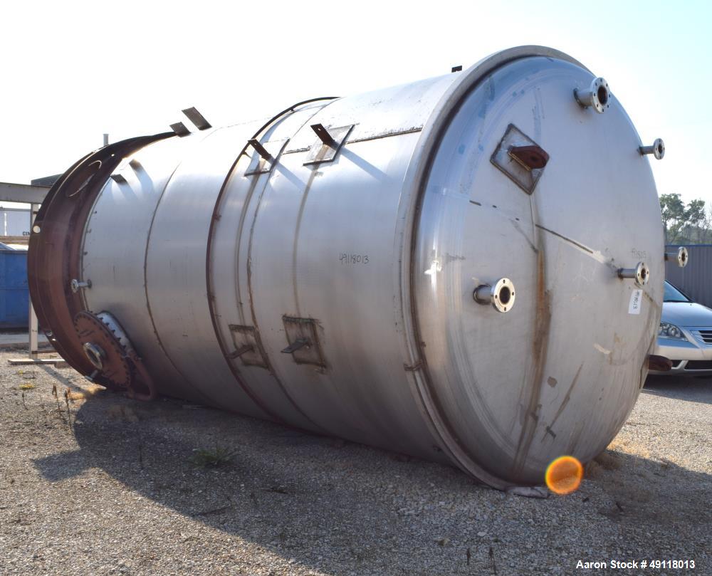 Unused- Central Fabricators Tank, 8,000 Gallon, Stainless Steel, Vertical. Approximate 114" diameter x 178" straight side, dished top & bottom. Openings top (3) 2", 3", 4", side (2) 2", 24" man way w...