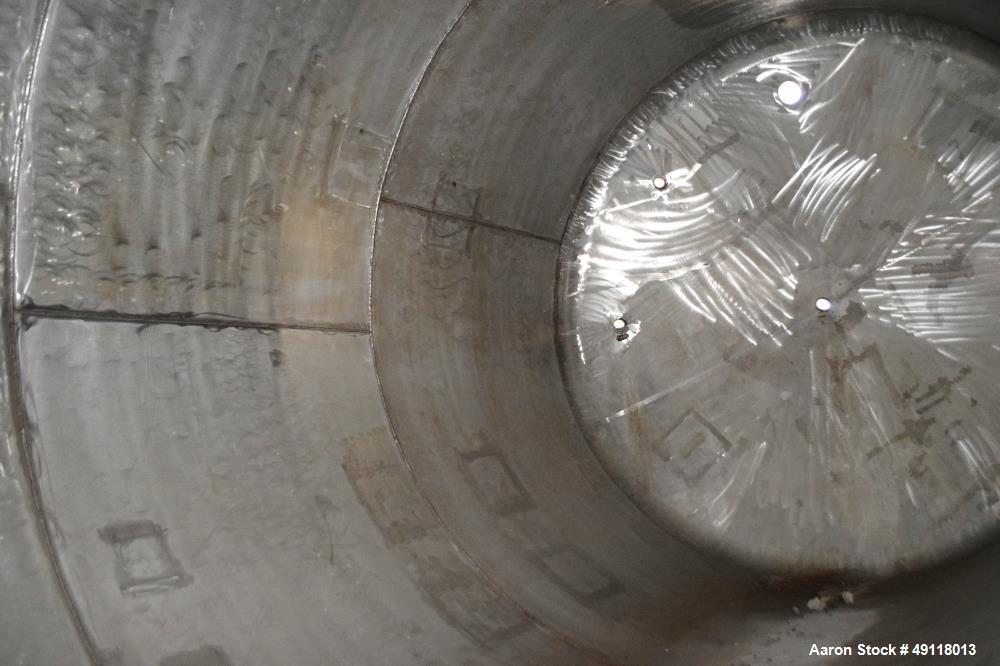 Unused- Central Fabricators Tank, 8,000 Gallon, Stainless Steel, Vertical. Approximate 114" diameter x 178" straight side, dished top & bottom. Openings top (3) 2", 3", 4", side (2) 2", 24" man way w...