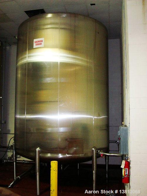 Used Cherry Burrell 6,000 Gallon Vertical Storage Tank. 9'3" diameter x 11'6" straight side, 15'6" overall height. 6 Stainless steel legs, dished heads, 3" tri-clamp CBO, 16-1/2" discharge height, si...
