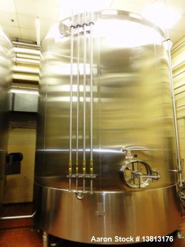 Used Cherry Burrell 9,000 Gallon Vertical Mixing Tank, Model 9000CV. 7.5hp bottom side agitator, 13' 3" straight wall x 16' 4" overall height x 11'5" diameter. Dish bottom / dish top. Dual CIP sprayb...