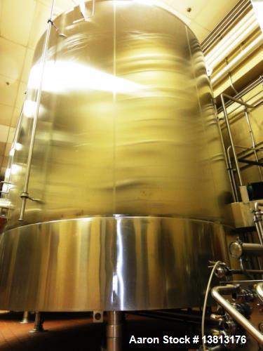 Used Cherry Burrell 9,000 Gallon Vertical Mixing Tank, Model 9000CV. 7.5hp bottom side agitator, 13' 3" straight wall x 16' 4" overall height x 11'5" diameter. Dish bottom / dish top. Dual CIP sprayb...