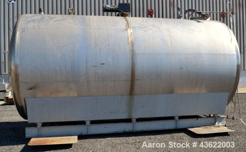 Used Cherry-Burrell Type C Tank, 6,000 Gallon, Model CH, 304 Stainless Steel, Horizontal. 96” Diameter x 184” straight side, dished heads. Top entering agitator with a 1” diameter shaft with (4) padd...
