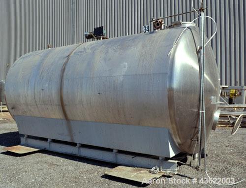 Used Cherry-Burrell Type C Tank, 6,000 Gallon, Model CH, 304 Stainless Steel, Horizontal. 96” Diameter x 184” straight side, dished heads. Top entering agitator with a 1” diameter shaft with (4) padd...
