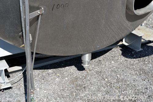 Used Cherry-Burrell Type C Tank, 6,000 Gallon, Model CH, 304 Stainless Steel, Horizontal. 96” Diameter x 184” straight side, dished heads. Top entering agitator with a 1” diameter shaft with (4) padd...