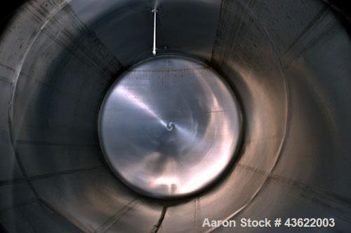 Used Cherry-Burrell Type C Tank, 6,000 Gallon, Model CH, 304 Stainless Steel, Horizontal. 96” Diameter x 184” straight side, dished heads. Top entering agitator with a 1” diameter shaft with (4) padd...