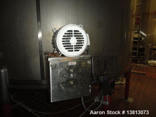Used Cherry Burrell Model CVL 10,000 Gallon Side Agitated Tank. Includes 5 hp, 3485 rpm Tri Clover 2 1/2" x 2" transfer pump. Dish top and dish bottom with side manway. Bottom side agitator. Slow spe...