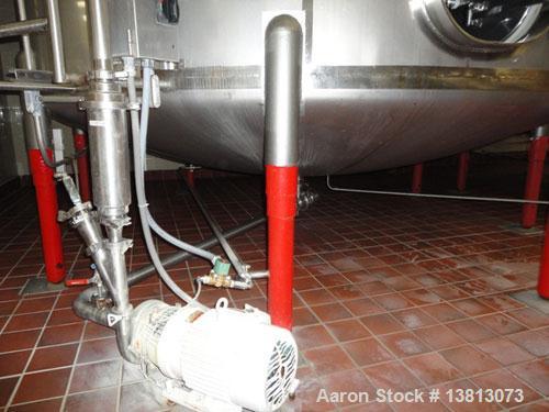 Used Cherry Burrell Model CVL 10,000 Gallon Side Agitated Tank. Includes 5 hp, 3485 rpm Tri Clover 2 1/2" x 2" transfer pump. Dish top and dish bottom with side manway. Bottom side agitator. Slow spe...