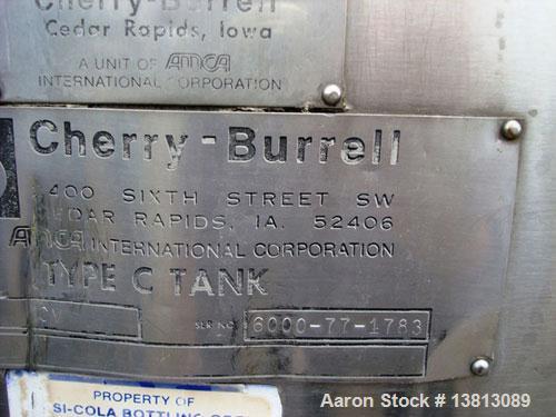 Used Cherry Burrell 6,000 Gallon Top Agitated Mixing Tank, Model CV.  Top agitated stainless steel single wall mixing tank with top agitator (missing shaft and propeller).  Includes dual CIP spray ba...