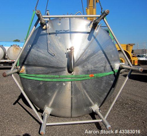 Used Cherry Burrell 5000 Gallon 304 Stainless Steel Mix Tank. Type CV. Approx. 8' Diameter x 12' 6"Straight Side. Dished Heads. Side 16" X 20" Oval Manway with Cover. Top Manway with Cover. Top Mount...