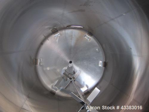 Used Cherry Burrell 5000 Gallon 304 Stainless Steel Mix Tank. Type CV. Approx. 8' Diameter x 12' 6"Straight Side. Dished Heads. Side 16" X 20" Oval Manway with Cover. Top Manway with Cover. Top Mount...