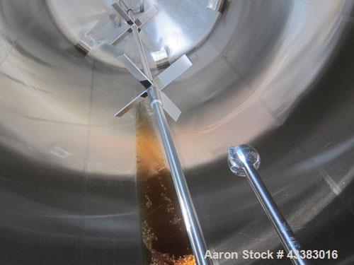 Used Cherry Burrell 5000 Gallon 304 Stainless Steel Mix Tank. Type CV. Approx. 8' Diameter x 12' 6"Straight Side. Dished Heads. Side 16" X 20" Oval Manway with Cover. Top Manway with Cover. Top Mount...