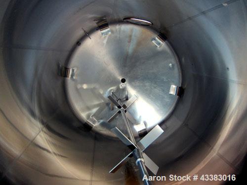 Used Cherry Burrell 5000 Gallon 304 Stainless Steel Mix Tank. Type CV. Approx. 8' Diameter x 12' 6"Straight Side. Dished Heads. Side 16" X 20" Oval Manway with Cover. Top Manway with Cover. Top Mount...