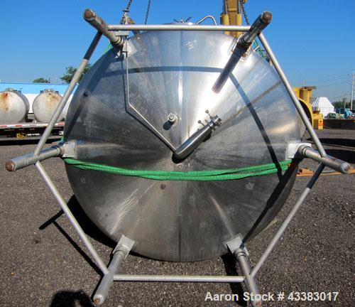 Used Cherry Burrell 5000 Gallon 304 Stainless Steel Mix Tank. Type CV. Approx. 8' Diameter x 12' 6"Straight Side. Dished Heads. Side 16" X 20" Oval Manway with Cover. Top Manway with Cover. Top Mount...