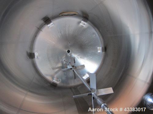 Used Cherry Burrell 5000 Gallon 304 Stainless Steel Mix Tank. Type CV. Approx. 8' Diameter x 12' 6"Straight Side. Dished Heads. Side 16" X 20" Oval Manway with Cover. Top Manway with Cover. Top Mount...