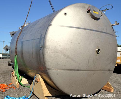 Used Cherry-Burrell Type C Tank, 10,000 Gallon, 304 Stainless Steel, Vertical. 126” Diameter x 172” straight side, dished top and bottom. Bottom side entering agitator with a 3 blade prop, driven by ...