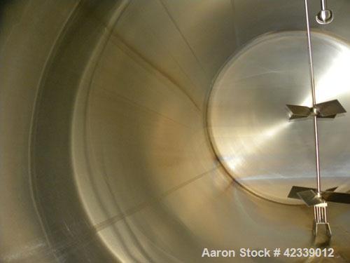 Used Cherry-Burrell Cold Wall Tank, 5000 Gallon, Model E, 304 Stainless Steel, Horizontal. 96" Diameter x 144" straight side, dished heads. Insulated with carbon steel sheathing. Approximate 102" x 7...