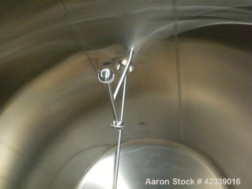 Used Cherry-Burrell Cold Wall Tank, 5000 Gallon, Model E, 304 Stainless Steel, Horizontal. 96" Diameter x 144" straight side, dished heads. Insulated with carbon steel sheathing. Approximate 102" x 7...