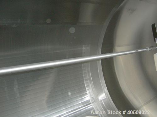 Used Cherry Burrell Silo Tank, 5,000 Gallon, Model SVW, 304 Stainless Steel, Vertical. 84" diameter x 213" straight side, dished top, sloped bottom. Partial sidewall cold jacket, 40 square feet, rate...