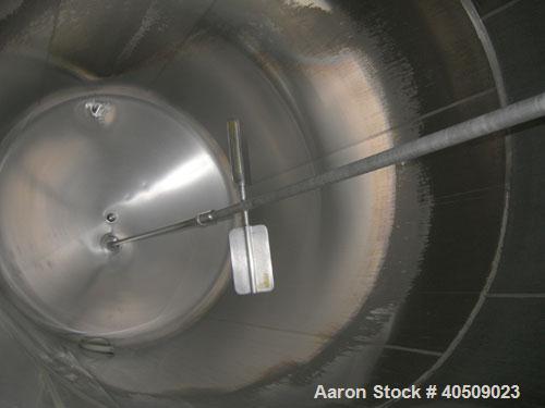 Used Cherry Burrell Silo Tank, 5,000 Gallon, Model SVW, 304 stainless steel, vertical. 84" diameter x 213" straight side, dished top, sloped bottom. Partial sidewall cold jacket, 40 square feet, rate...